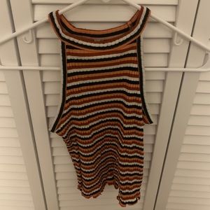 orange, brown, white, and black women’s tank top